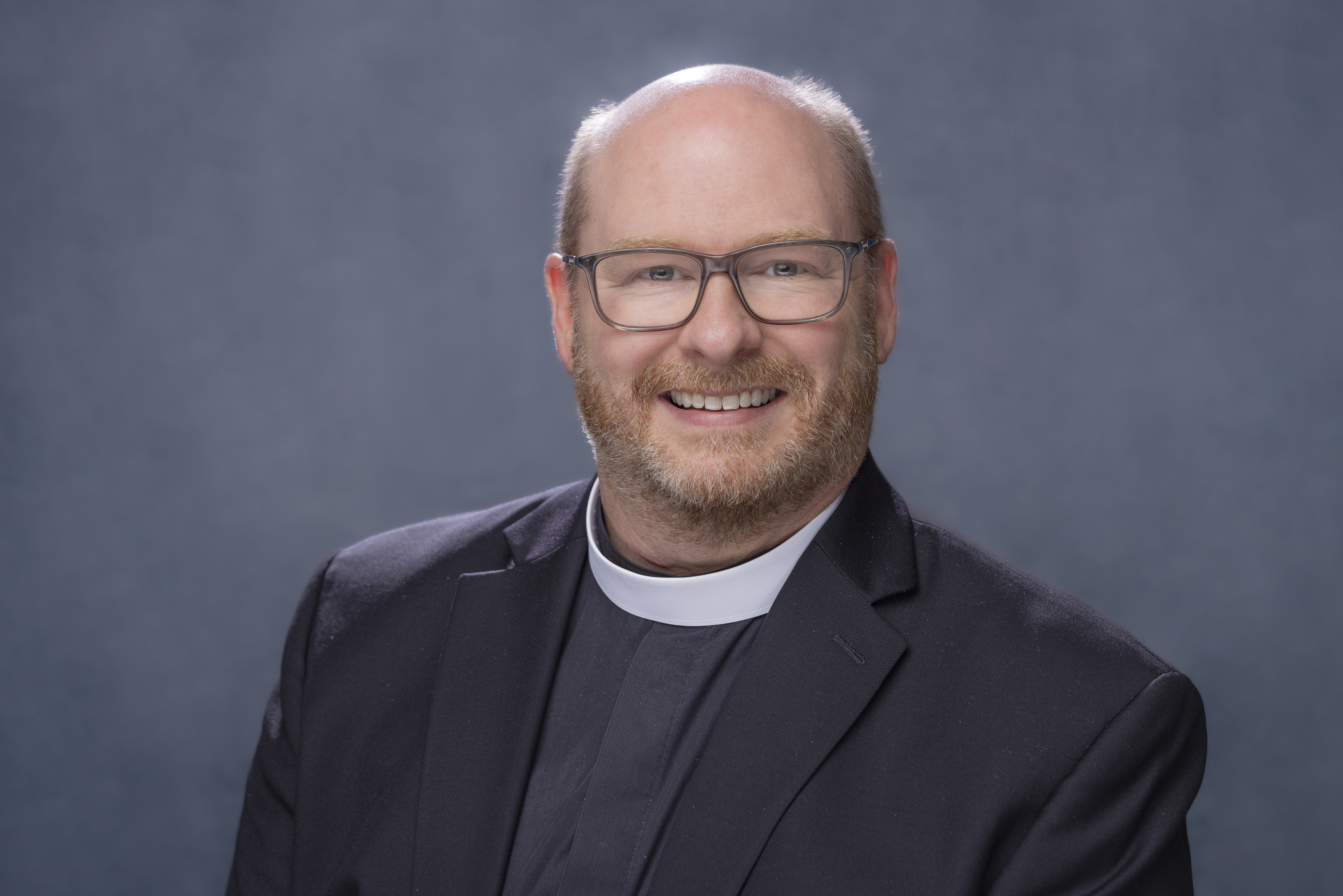 The Rev. Dr. Daniel Justin - Rector